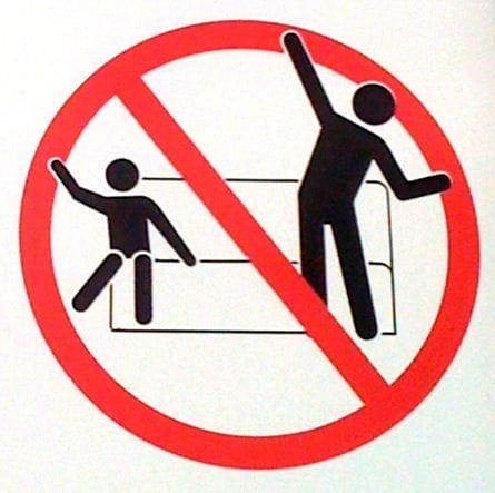 “No Dancing” sign on Disneyland rides